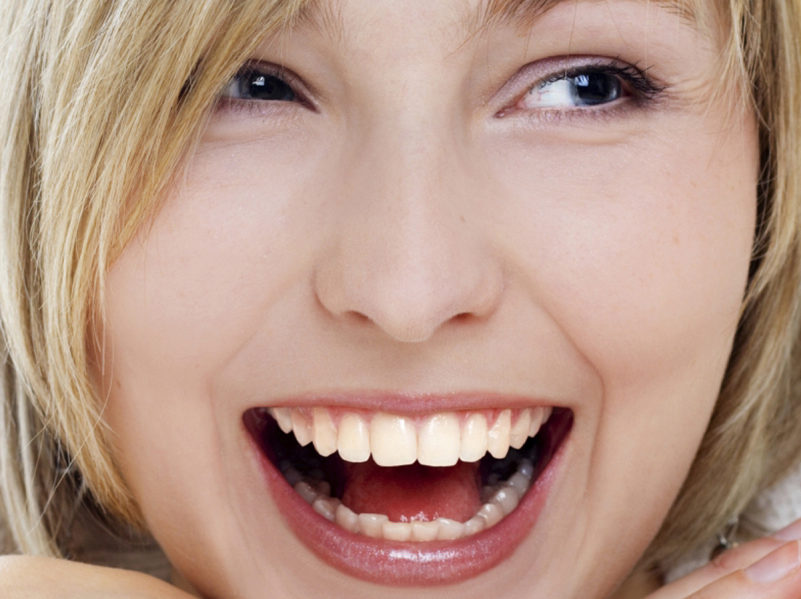 Smiling woman isolated on white background